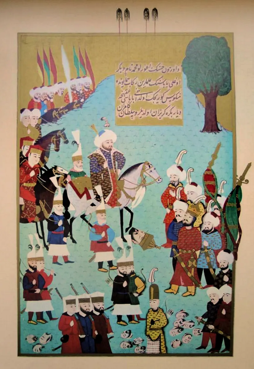 Uzun Hasan’ın oğlu Uğurlu Mehmed Bey’in babasının alemlerini Fatih’in huzurunda görmesi — Hünernâme I minyatürü (Topkapı Sarayı Müzesi Kütüphanesi (tarama: Wikimedia Commons))